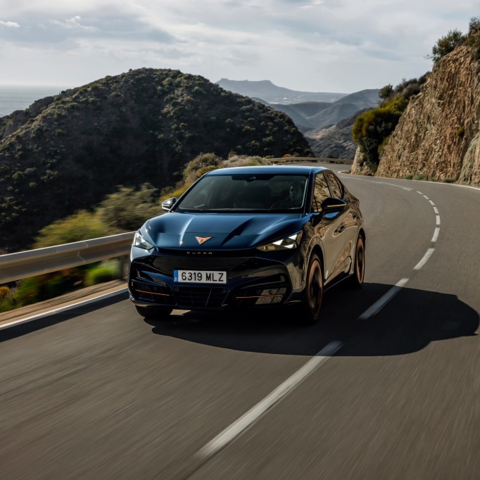 Electric SUV, CUPRA Tavascan car on a coastal road and a five star euro NCAP safety rating