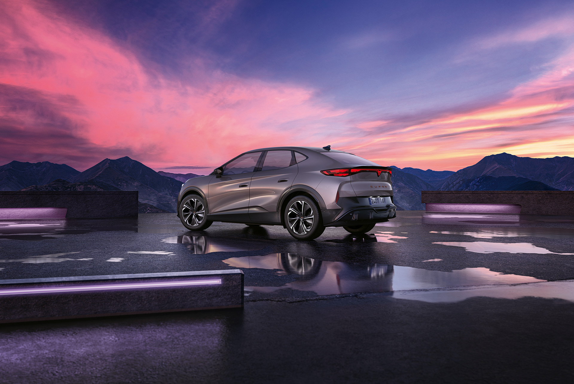 cupra tavascan SUV model showcased against a picturesque sunset